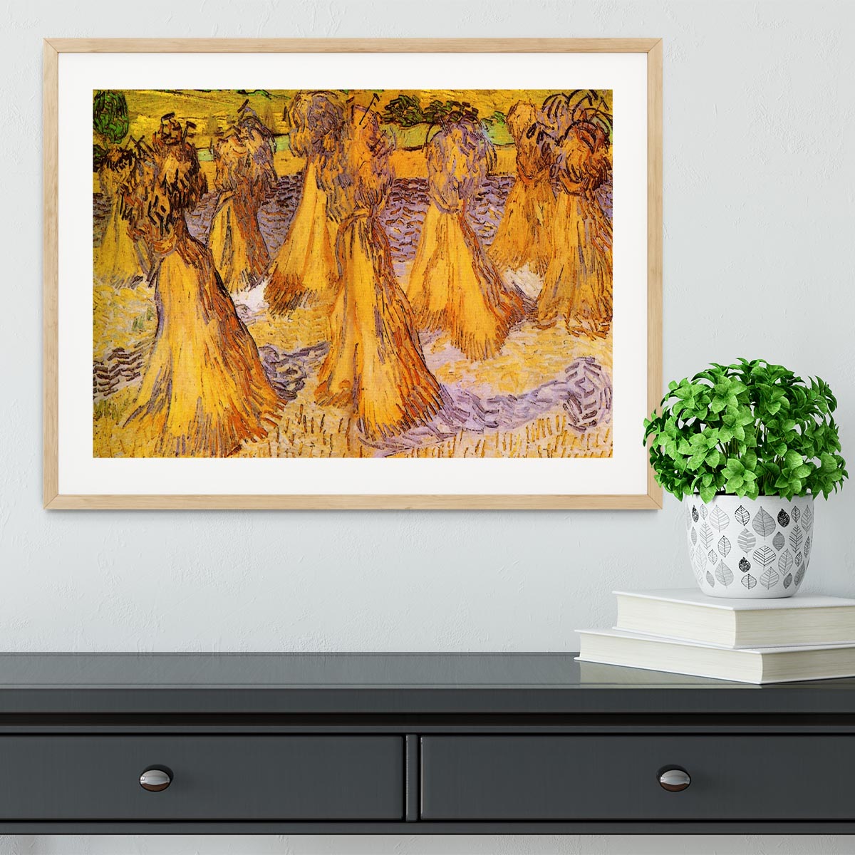 Field with Stacks of Wheat by Van Gogh Framed Print